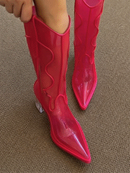 Rechargeable LED cowboy boots glowing in motion